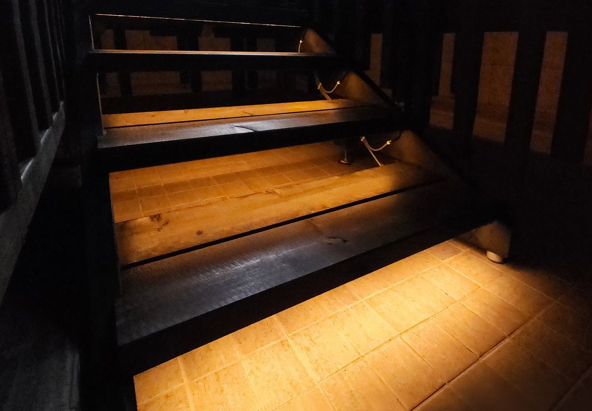 At the bottom of the stairs is an LED strip light, which makes it easier to walk. photo, The Punchers